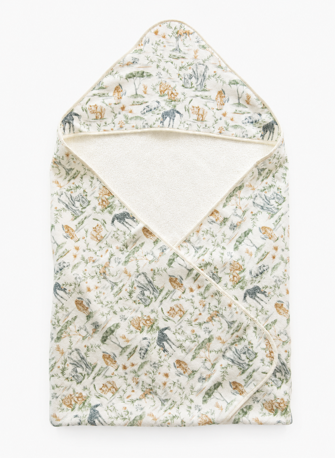 A folded baby wrap blanket with a hood, featuring a delicate woodland animal and plant pattern in muted green, blue, and orange on an off-white background, with a solid cream lining visible inside the hood.