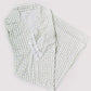 Textured robe with a subtle pattern on a light gray background
