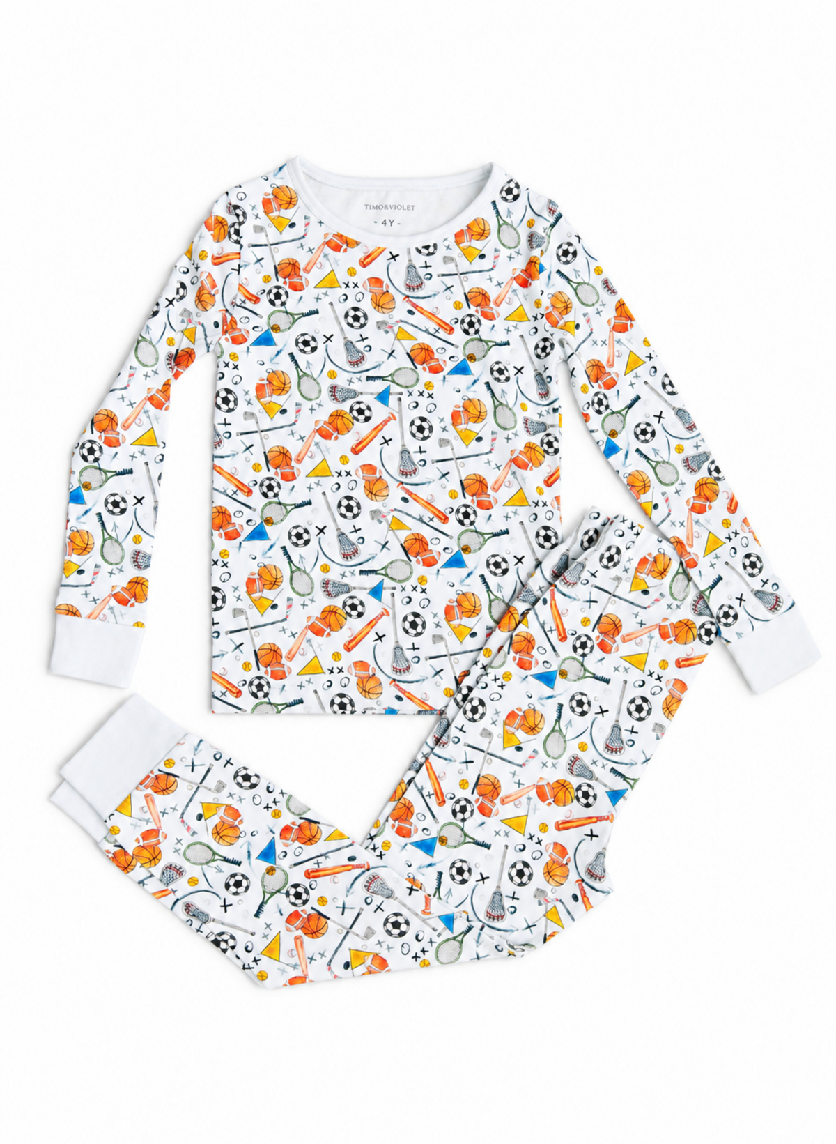 A two-piece kids' pajama set featuring a long-sleeve top and matching pants, both printed with a colorful soccer-themed pattern on a white background.