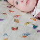 Organic cotton muslin shawl blanket by Timo & Violet