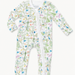 A baby long-sleeve footed sleeper with a white background and a colorful nature print featuring birds, flowers, and trees, shown flat on a white background.