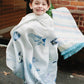 Organic cotton muslin shawl blanket by Timo & Violet
