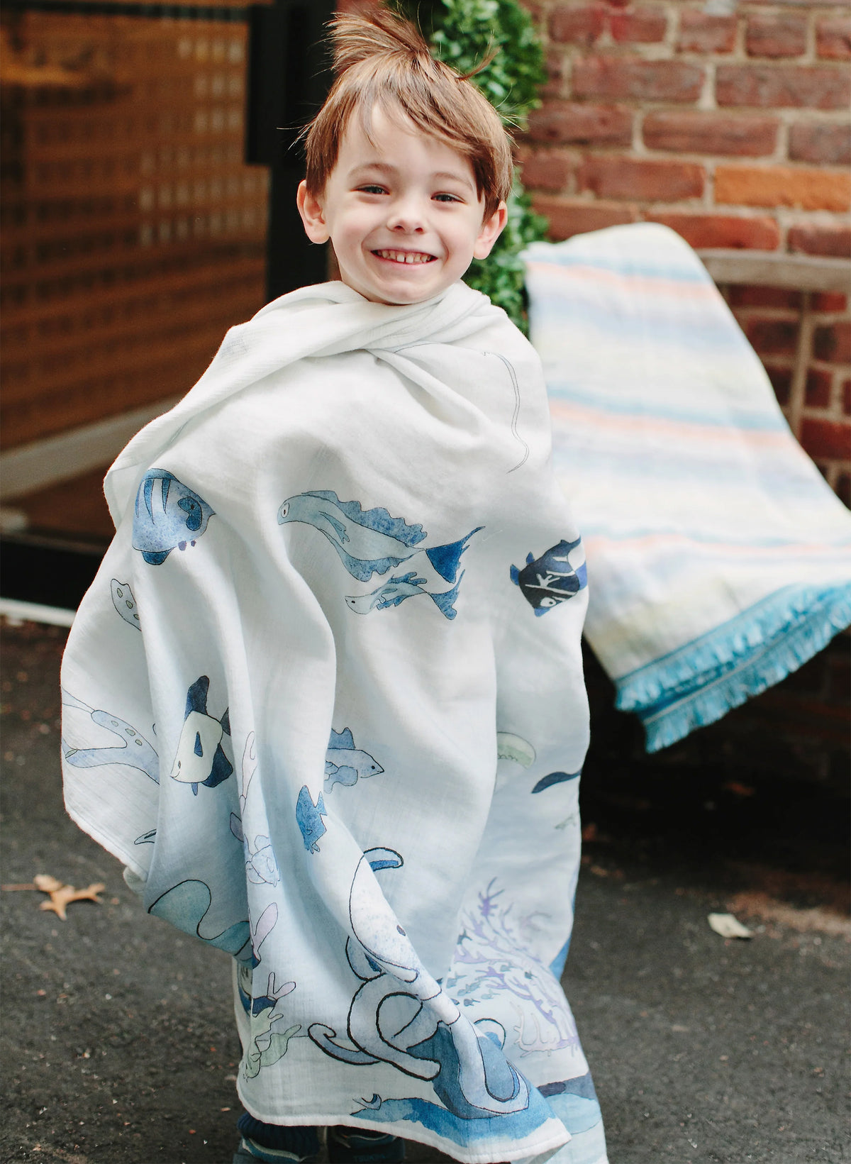 Organic cotton muslin shawl blanket by Timo & Violet