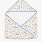 A baby hooded towel with a white background and a colorful hot air balloon pattern, finished with light blue trim.