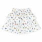 A white tiered ruffle skirt with an all-over colorful butterfly print, featuring a smocked elastic waistband.